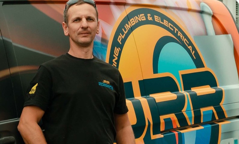 Jurek Szczachor in front of the JRR Jurek Gas van in Glasgow