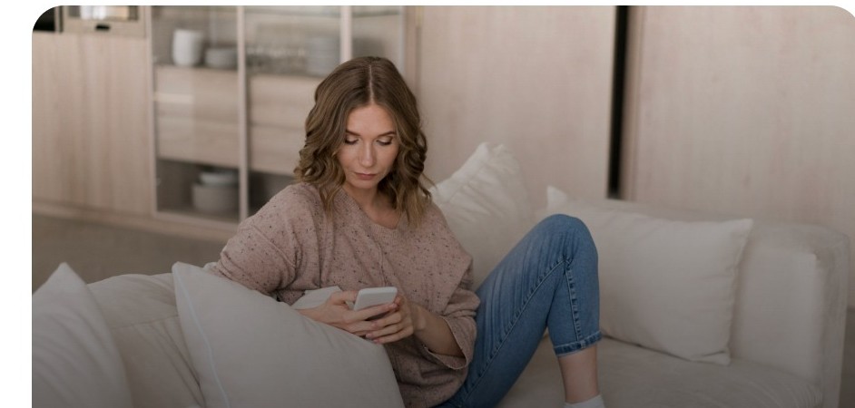 Customer contacting JRR Jurek Gas from her sofa